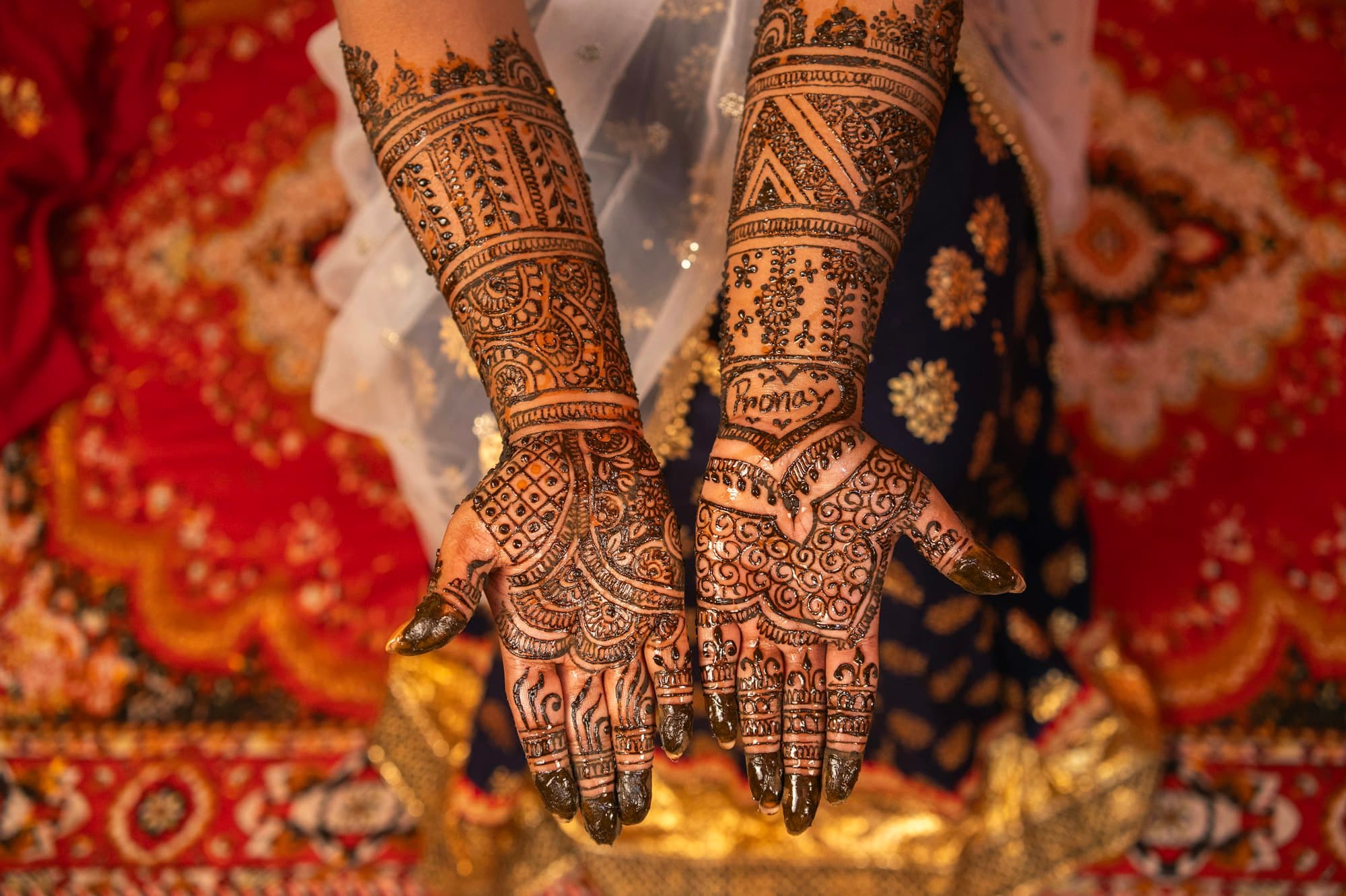 Close-up of a hand with fine bridal henna